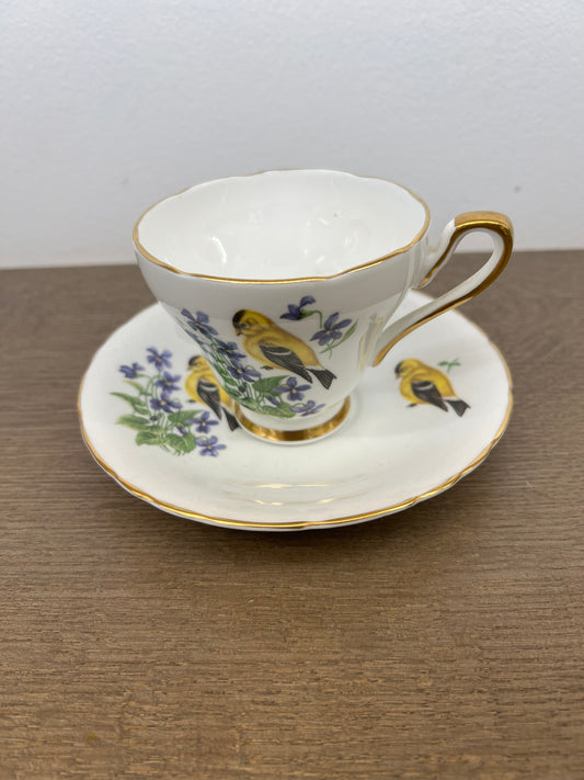 SUTHERLAND CUP AND SAUCER WITH YELLOW BIRD